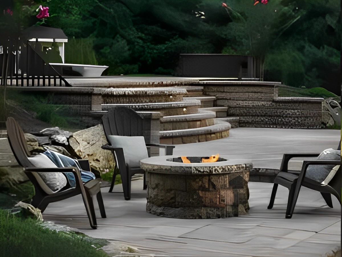 a-fire-pit-sitting-in-the-middle-of-a-patio